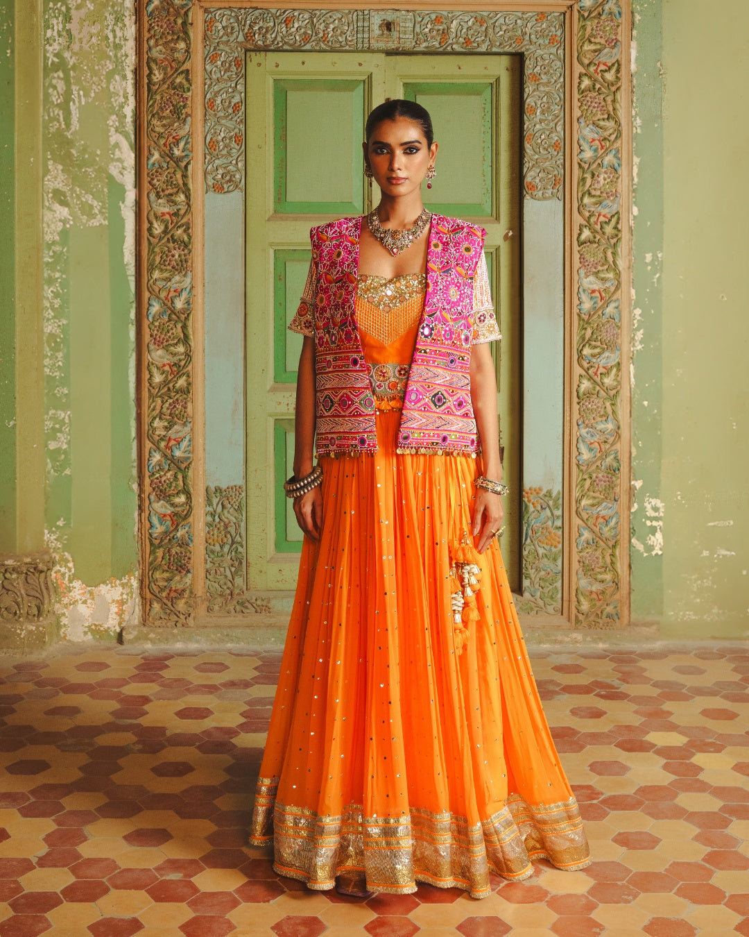 MANGO YELLOW LAMPI LEHENGA WITH KUTCHI PATEL HAND EMBROIDERED JACKET
