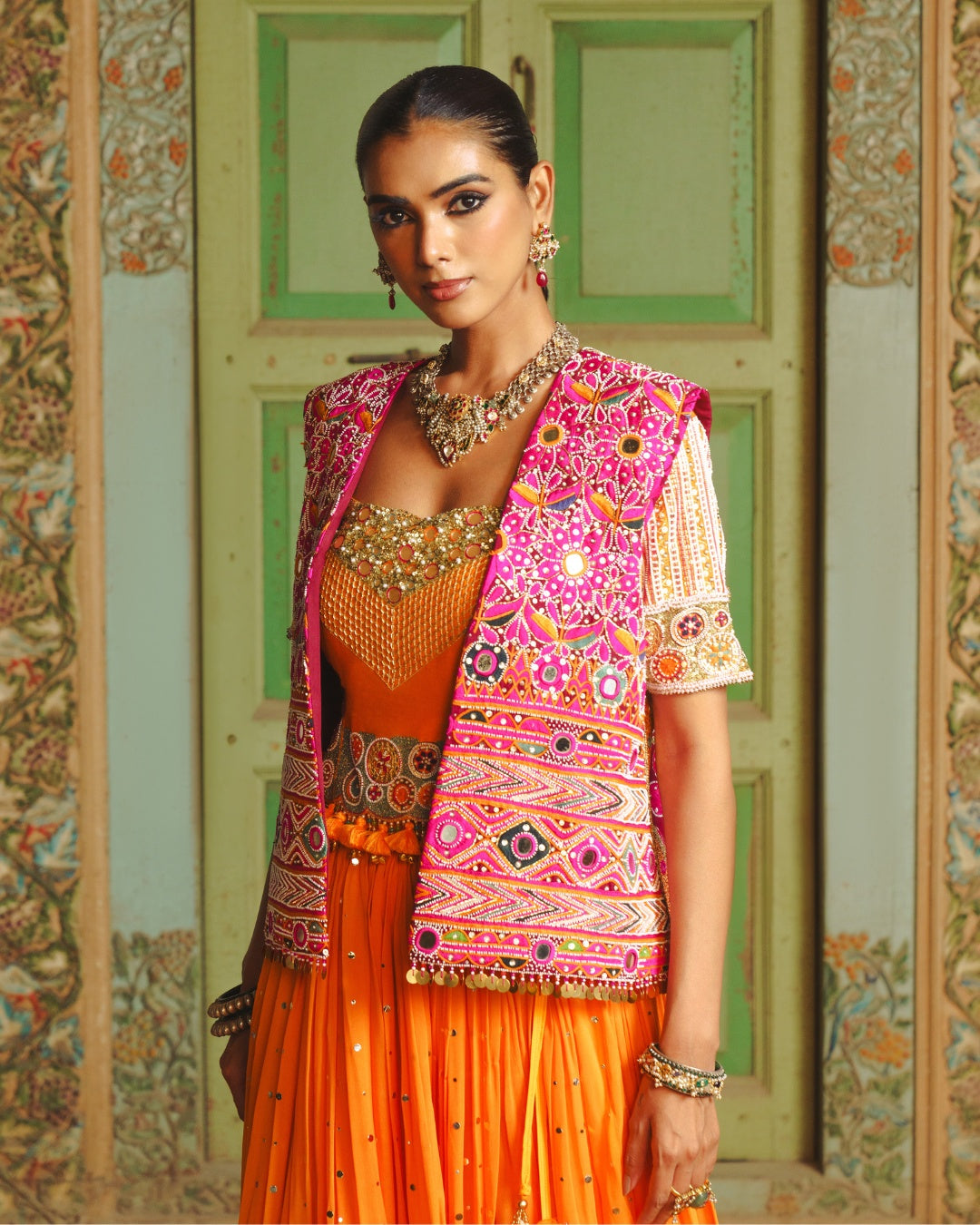MANGO YELLOW LAMPI LEHENGA WITH KUTCHI PATEL HAND EMBROIDERED JACKET