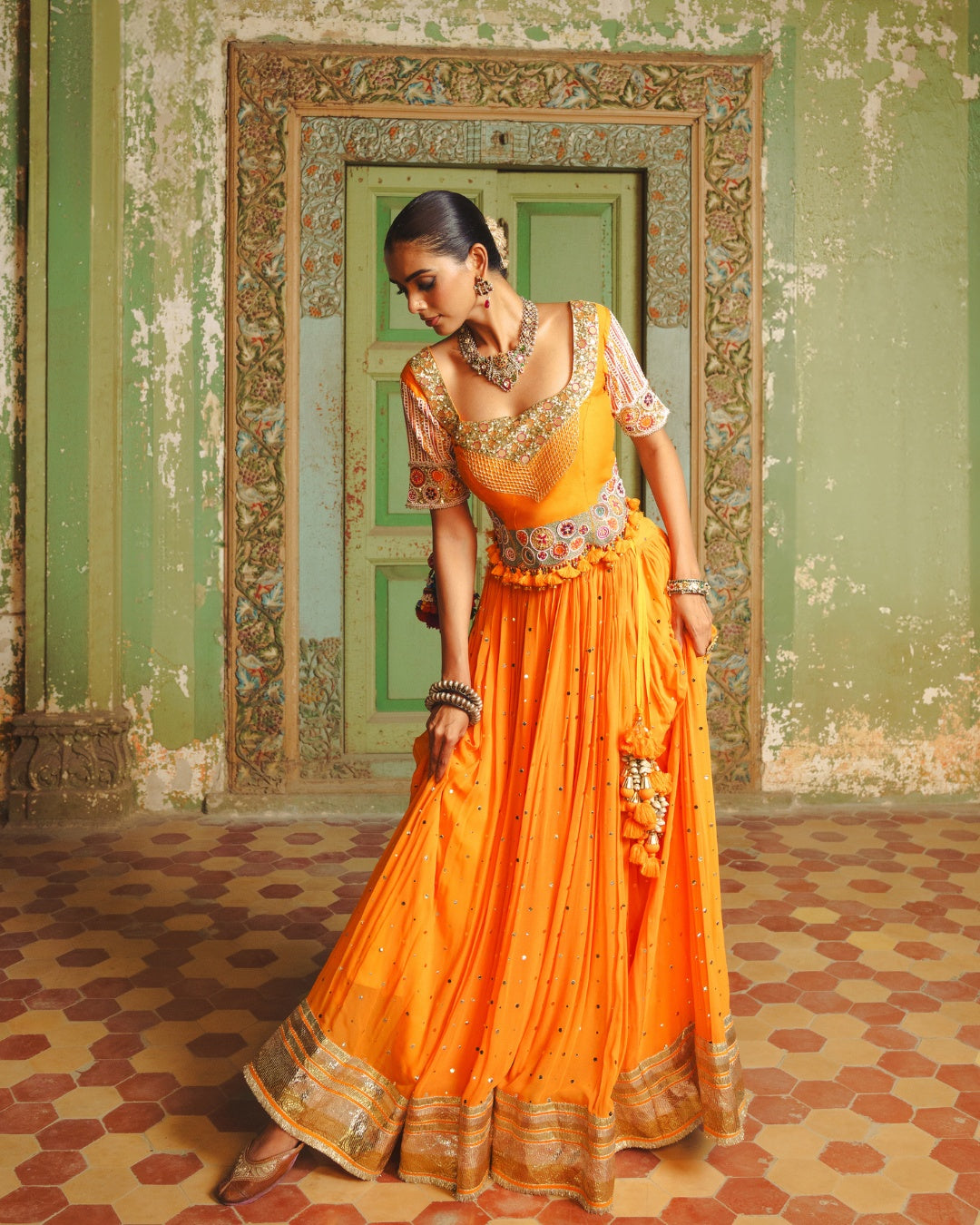 MANGO YELLOW LAMPI LEHENGA WITH KUTCHI PATEL HAND EMBROIDERED JACKET